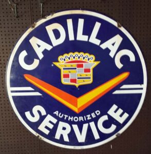 Cadillac V porcelain sign that is rare.....48" and double sided in very nice condition
